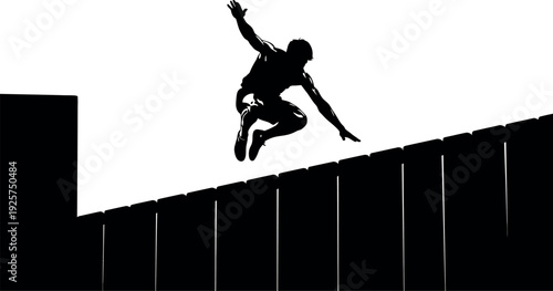 Silhouette of a skateboarder jumping off a ramp