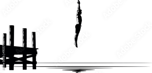 Silhouette of a tall structure and a pier on a body of water