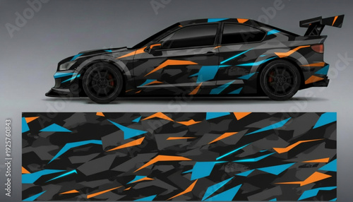 Sporty car with a modern geometric camouflage vinyl wrap design in black, blue, and orange colors.