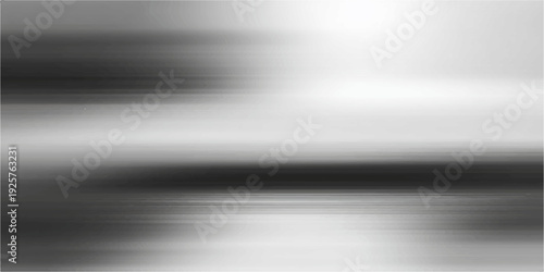 A polished brushed metal texture features a shiny silver stainless steel plate with a gray industrial pattern and light metallic finish for a sleek aluminum backdrop