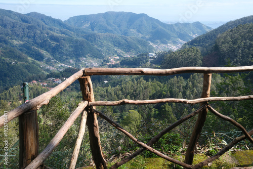 Rustic wooden balcony at viewpoint overlooking scenic eastern Madeira landscape