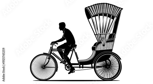 Silhouette of a rickshaw puller riding a bicycle with a passenger