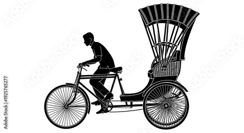 Silhouette of a rickshaw puller riding a bicycle with a passenger