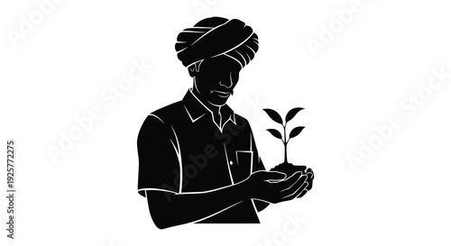 Indian farmer holding a seedling depicted as a striking black silhouette