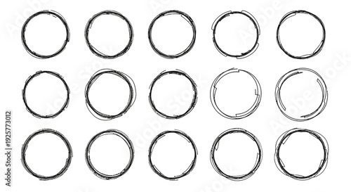 Collection of assorted metal rings on white background.