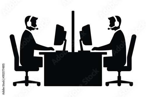 Two Call Center Operators Working Side by Side at Computers