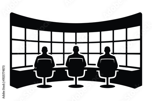 Three People in Control Room Watching Multiple Screens