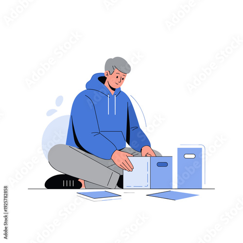 Caucasian elderly male packing boxes in casual outfit