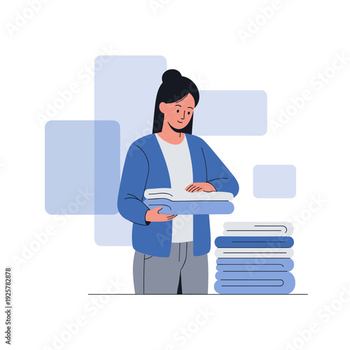 Asian female adult folding laundry in blue room setting