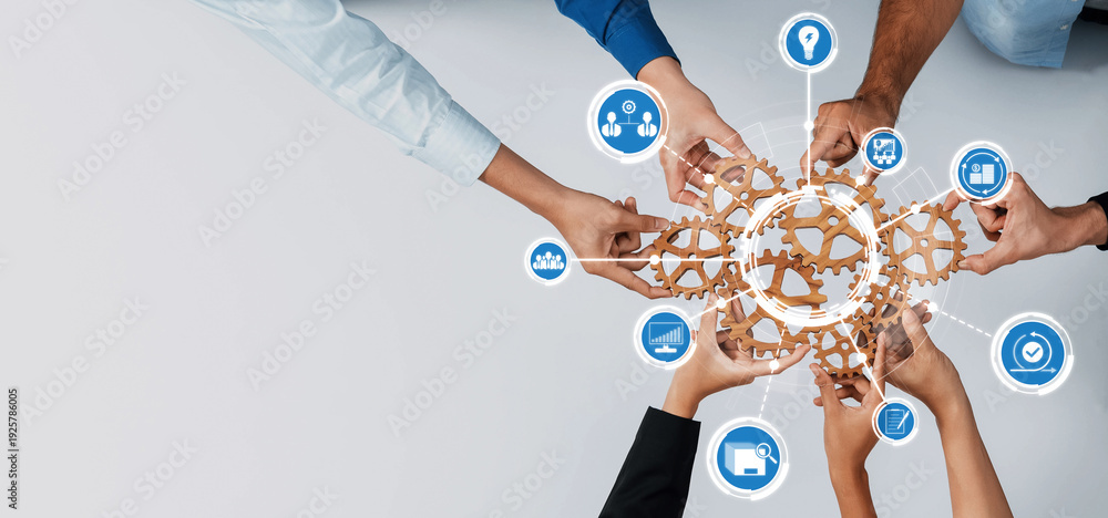 © InfiniteFlow - A vibrant image showcasing diverse hands grasping interconnected gears, representing teamwork and collaboration within a modern business environment. Amity