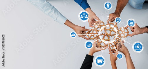 Fotografie A vibrant image showcasing diverse hands grasping interconnected gears, representing teamwork and collaboration within a modern business environment