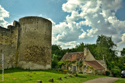 Druyes-les-belles-fontaines, France - July 26th 2014 : Very rustic house, within the walls of the fortified castle.