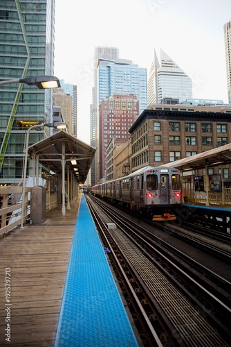 Wallpaper Mural View of Chicago Subway with Buildings flanking the tracks at Sunrise Torontodigital.ca