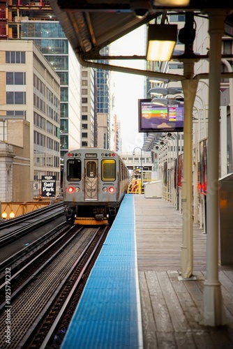 Wallpaper Mural View of Chicago Subway with Buildings flanking the tracks at Sunrise Torontodigital.ca