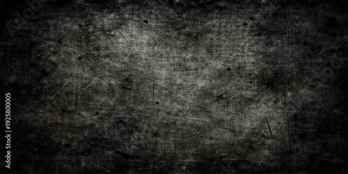 A dark and vintage black and white grunge background featuring a rough textured stone wall pattern with an aged grey concrete surface for a dirty and blank paper backdrop