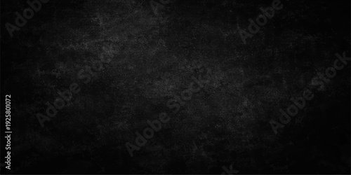 A dark and vintage black grunge background features a heavily textured grey concrete wall surface with an aged, dirty pattern for a blank chalkboard backdrop design