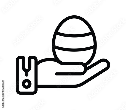 Hand gently holds a striped egg, symbolic.