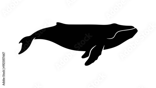 A sleek, minimalist black silhouette of a humpback whale gracefully swimming in the vast ocean, evoking a sense of marine life and natural beauty