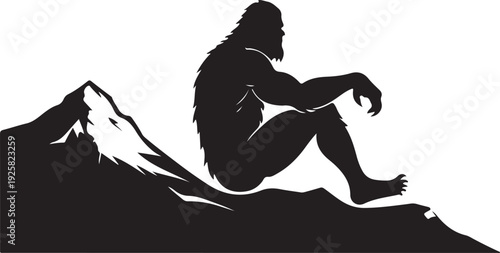 bigfoot sitting on the mountain silhouette