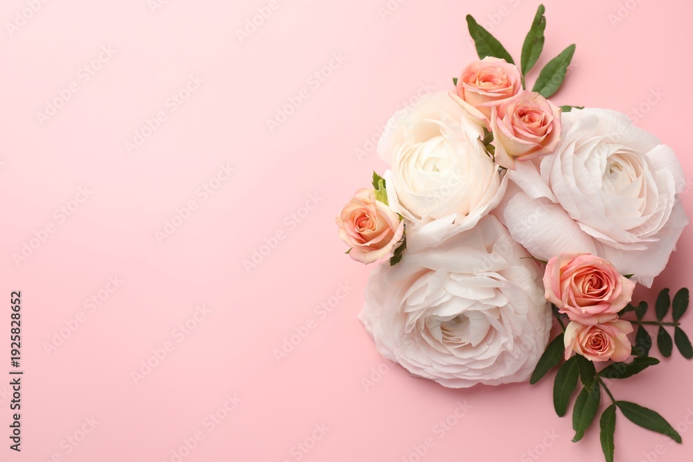 Fototapeta premium Beautiful flowers on pink background, flat lay. Space for text