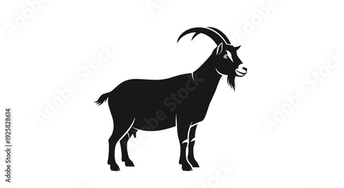 Silhouette of a majestic male goat with large curved horns standing alertly a symbol of strength and resilience