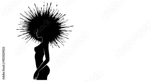 Silhouette of a woman with voluminous spiky afro hairstyle side profile elegant pose representing individuality natural