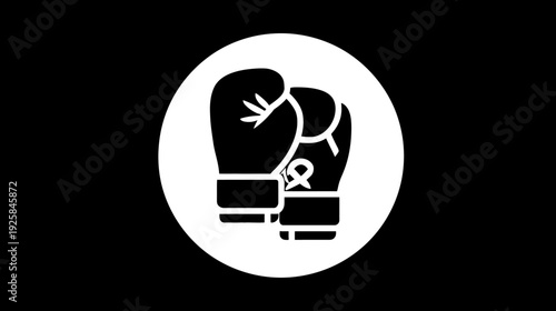 Two black boxing gloves in a white circle, presented against a black backdrop, one with a ribbon