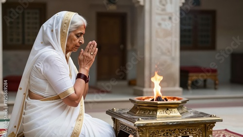 Dignified Parsi matriarch in crisp white saree offering prayers at ornate Zoroastrian fire temple altar, soft morning light illuminating devotion.