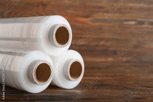 Rolls of stretch wrap on wo...