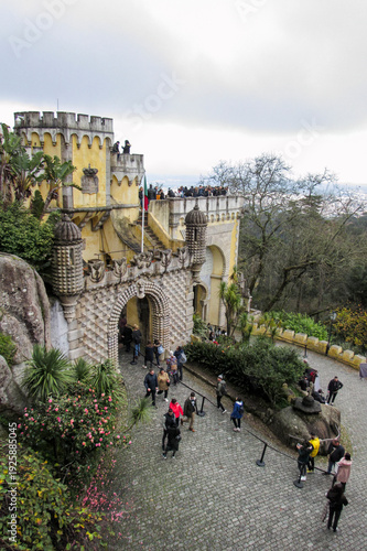 Visitors entering the ornate gates of Pena Palace.