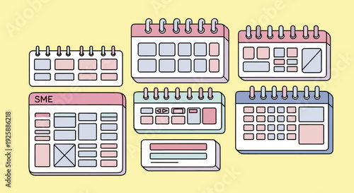 Collection of office planners and notebooks displayed on a bright yellow background from a straightforward viewpoint