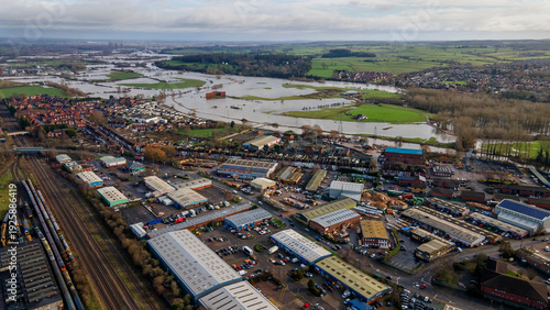 Fotografie Suburban town border with flooded river meadows in background