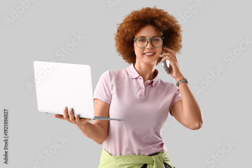 Young female programmer wit...