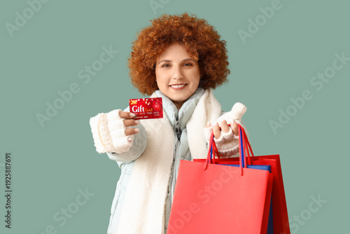 Redhead young woman in wint...