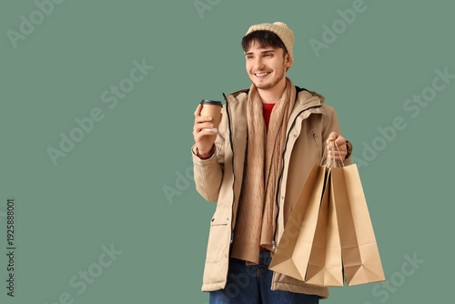 Young man in winter clothes...