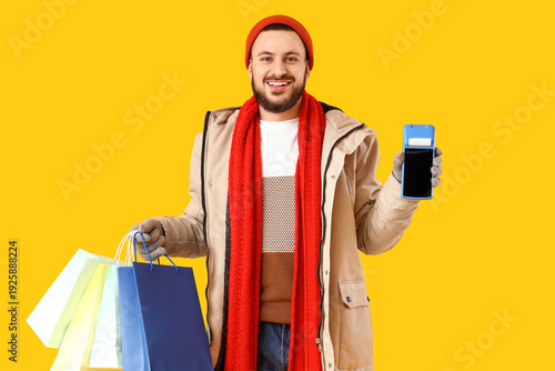 Young man in winter clothes...