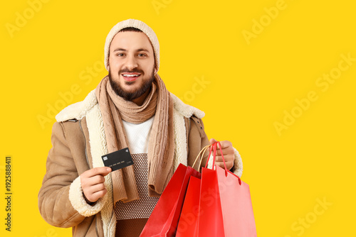 Young man in winter clothes...