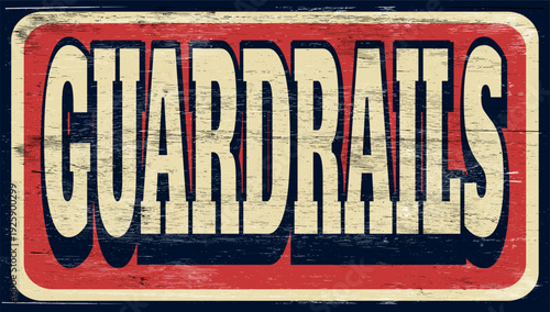 Aged and worn guardrails sign on wood