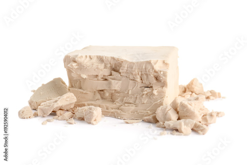 Pieces of fresh yeast on wh...