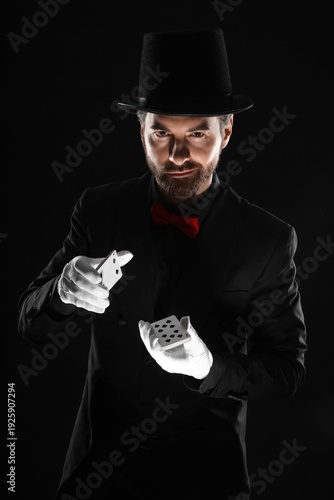 Male magician with playing ...