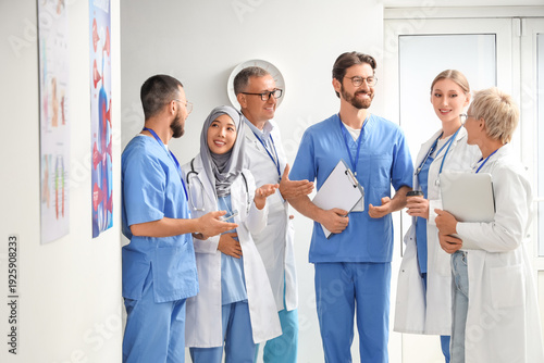 Doctors talking in hall of clinic