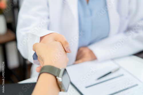 Happy asian man patient handshake with doctor nutritionist after success medical consulting diagnosis for weight control in clinic, dietitian healthcare with service, appointment for health wellness.
