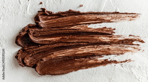 Indulgent Creamy Chocolate Texture Spread on White Background for Culinary Inspiration and Food Art