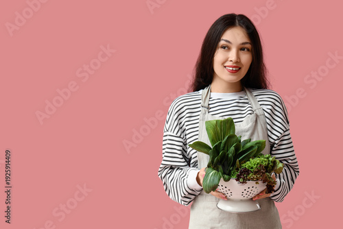 Beautiful young happy Asian...