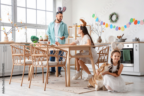 Happy parents with their li...