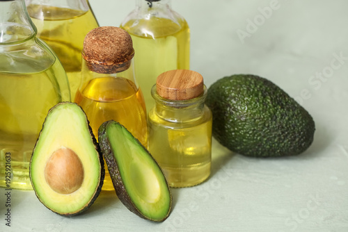 Bottles of fresh avocado oi...