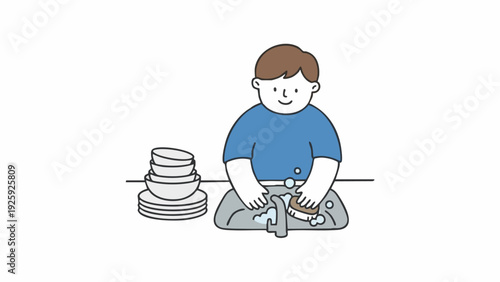 Boy washing dishes at the kitchen sink.