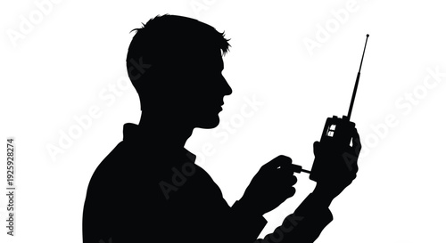 Black silhouette of man holding mobile phone