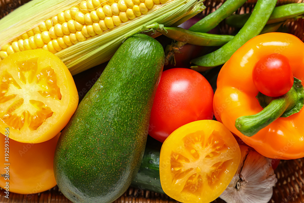 Fototapeta premium Wicker basket with different fresh vegetables, closeup