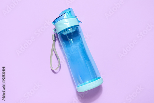 Sports water bottle on lila...